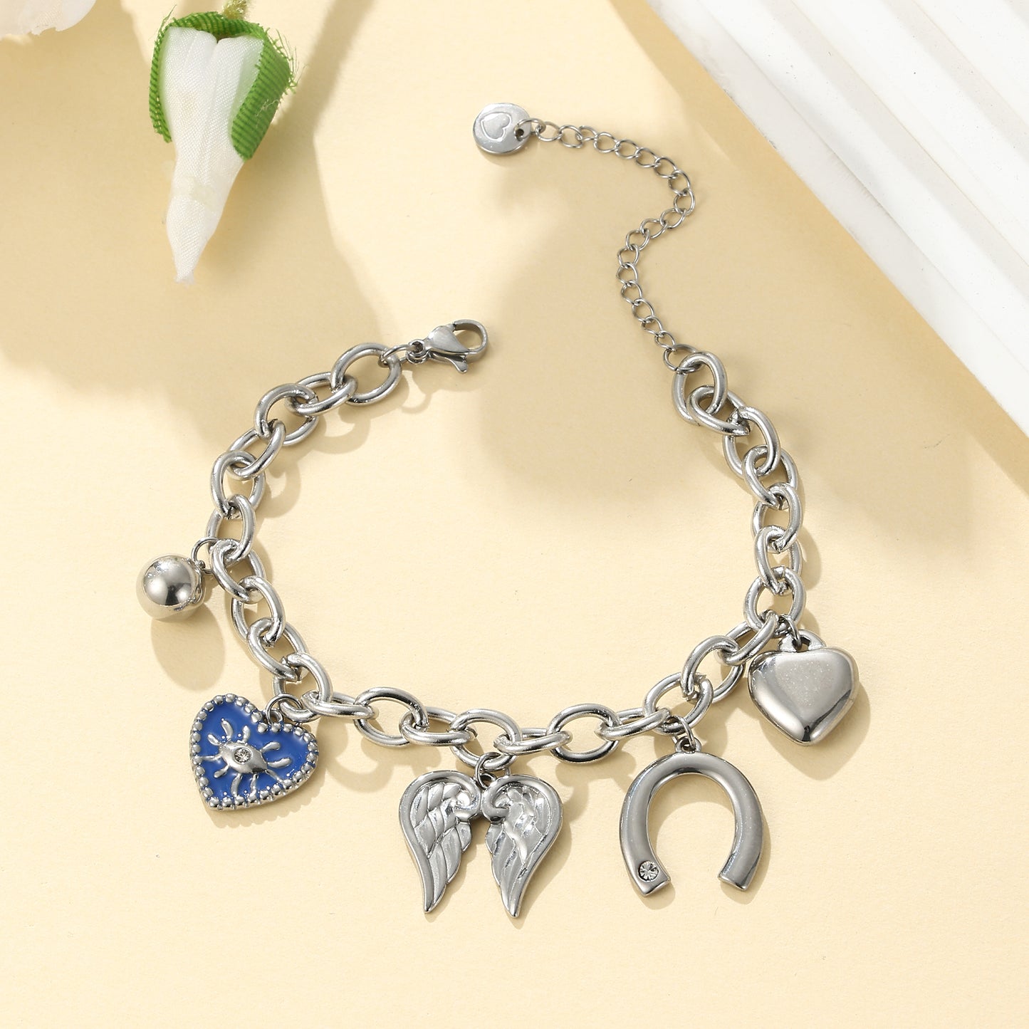 MY1708 Stainless Steel Bracelet at Wholesale Price [ Wing and Heart Charm ]